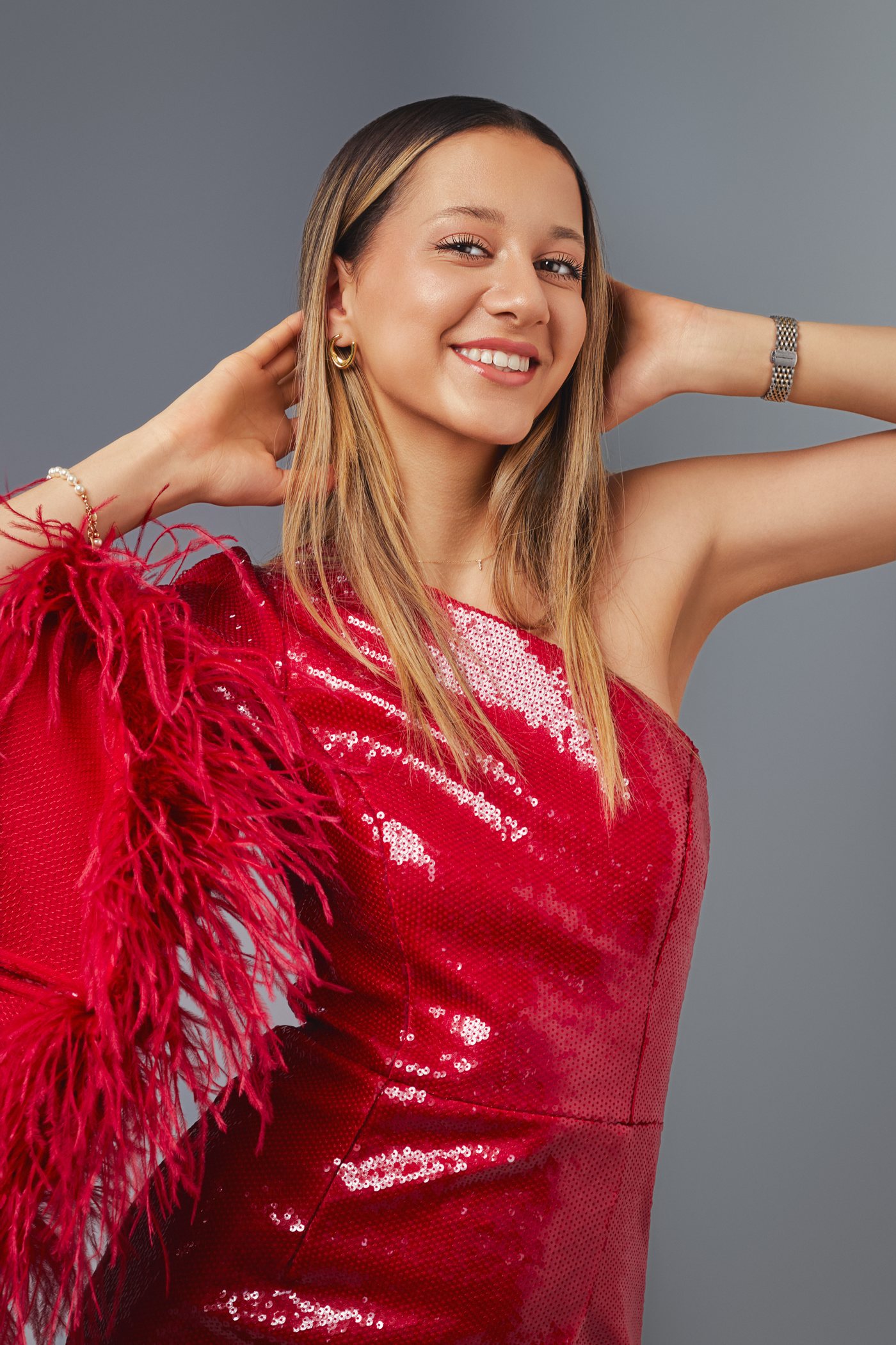 Commercial, smiling portrait in red