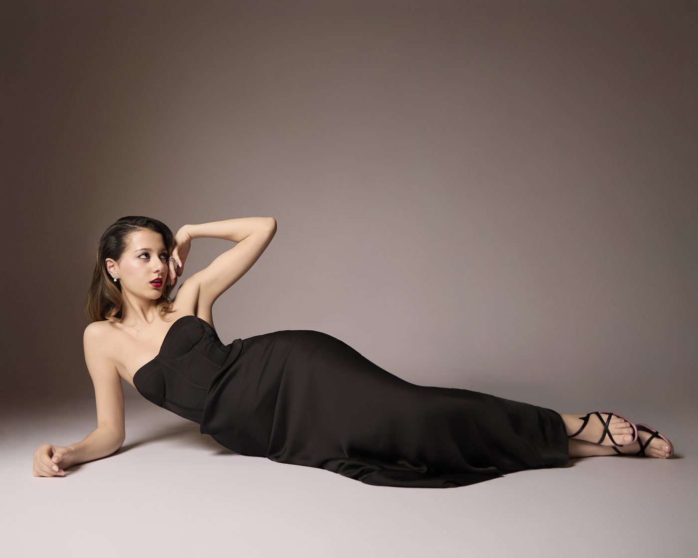 Fashion, black gown, reclining